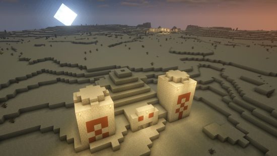 Minecraft seeds: Um templo do deserto em primeiro plano, com uma vila no deserto no horizonte.