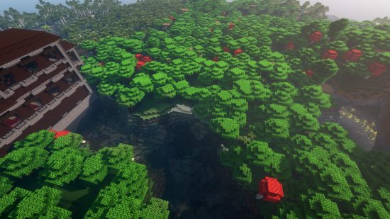 Melhores seeds do Minecraft: uma mansão do bosque nas margens de um rio no Minecraft, em frente a uma caverna exuberante.